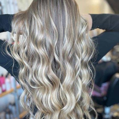 Hair Salon For Cool Blonde Balayge, Layered Haircut, and Hair Extensions - Salon Inspire in Kansas City, MO